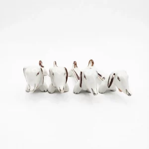 Lot de 4 porte-couteaux en porcelaine